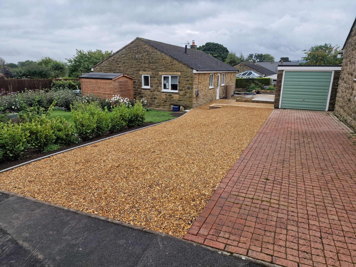 Gravel driveway and block paving